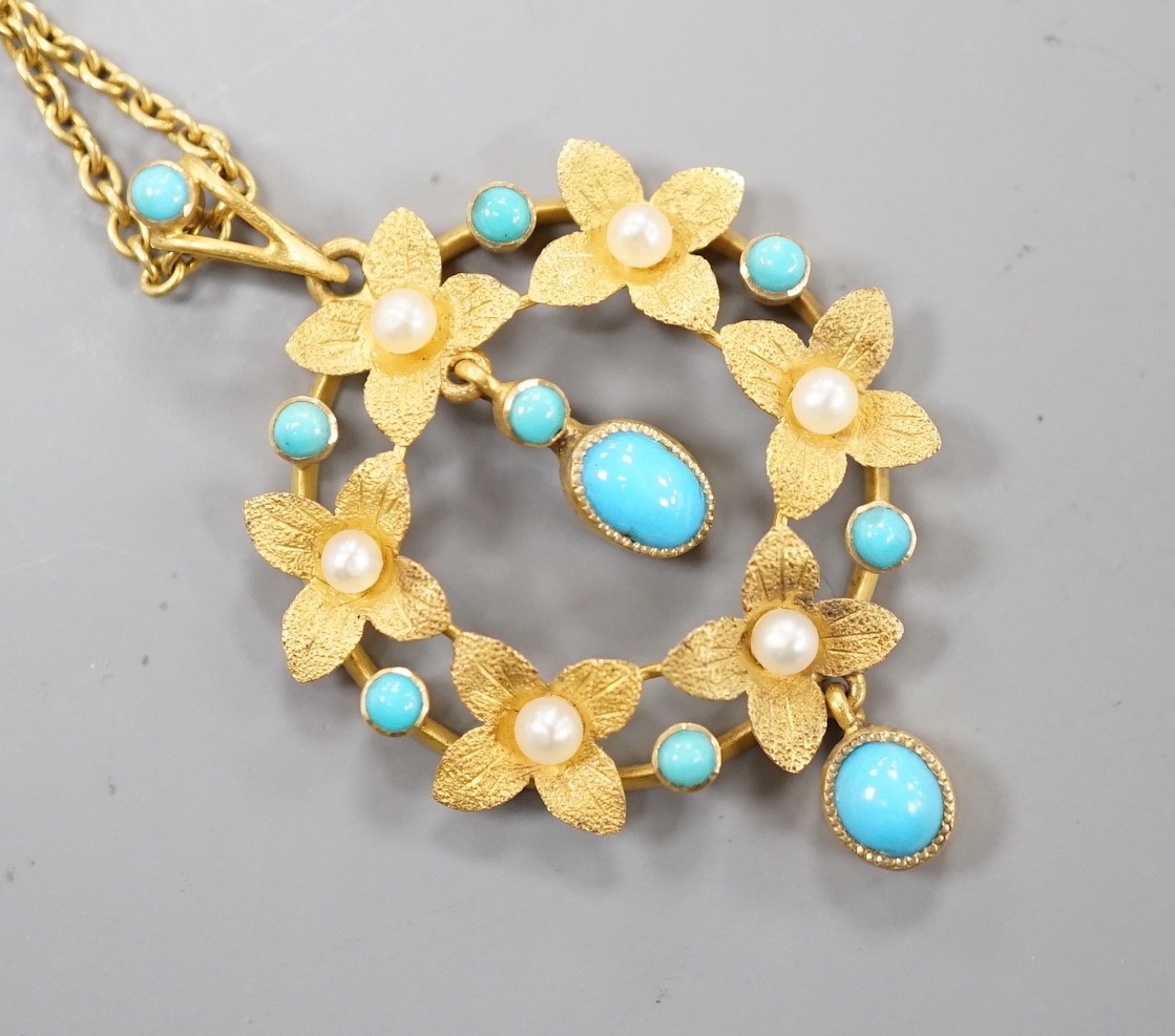 An Edwardian 15ctm turquoise and seed pearl set drop pendant necklace, pendant 35mm, chain 33cm, gross weight 4.9 grams.